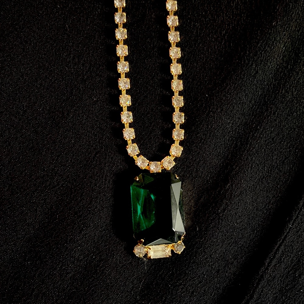 Costume jewelry at its finest - faux diamonds and a gigantic faux emerald